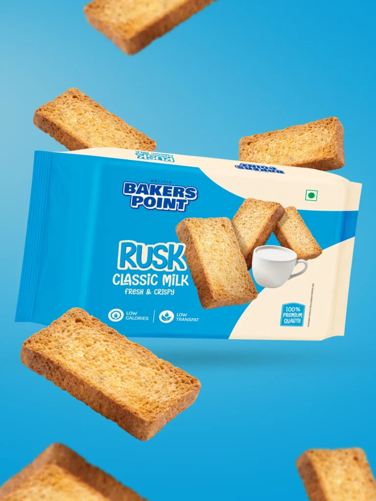 Baker's Point Classic Milk rusk pack among floating rusk slices